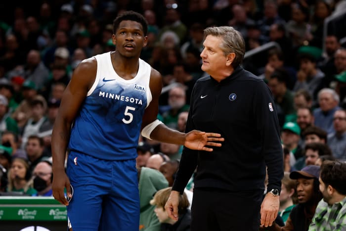 Jan 10, 2024; Boston, Massachusetts, USA; Minnesota Timberwolves head coach Chris Finch talks with guard Anthony Edwards (5) during the second quarter against the Boston Celtics at TD Garden.